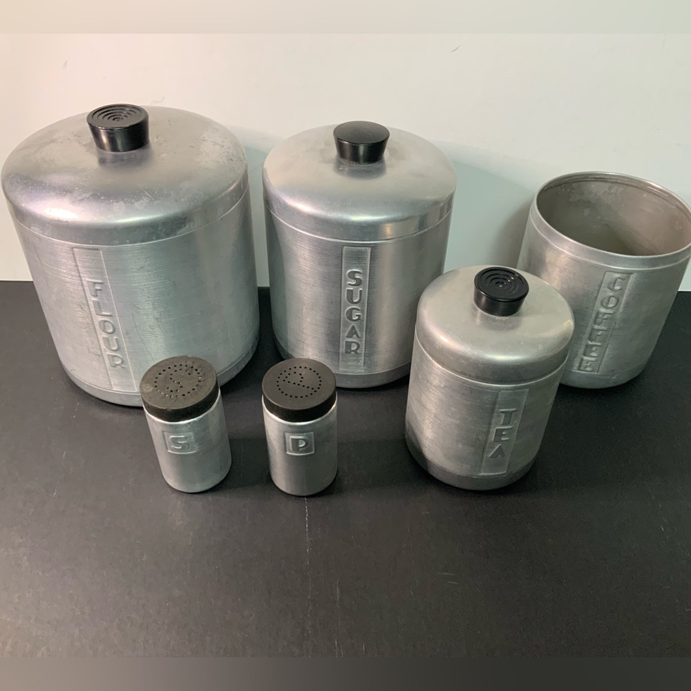 Vintage brushed Aluminum canister 7 piece 	set with matching Salt & Pepper